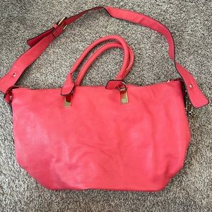 Bright pink purse from Wilson’s Leather. Has some wear, but still looks nice.